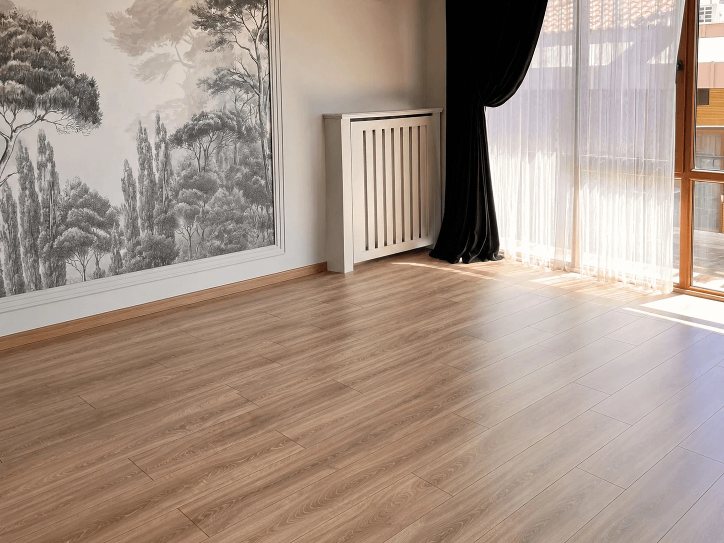 brand-craftsmanship-and-heritage-page Spacious empty room with hardwood floors prior to furnishing.