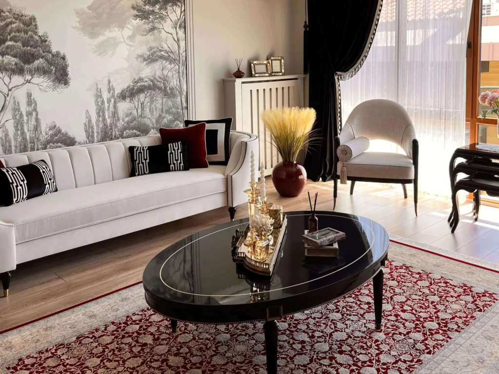 Elegant living room interior featuring an oval black marble coffee table.