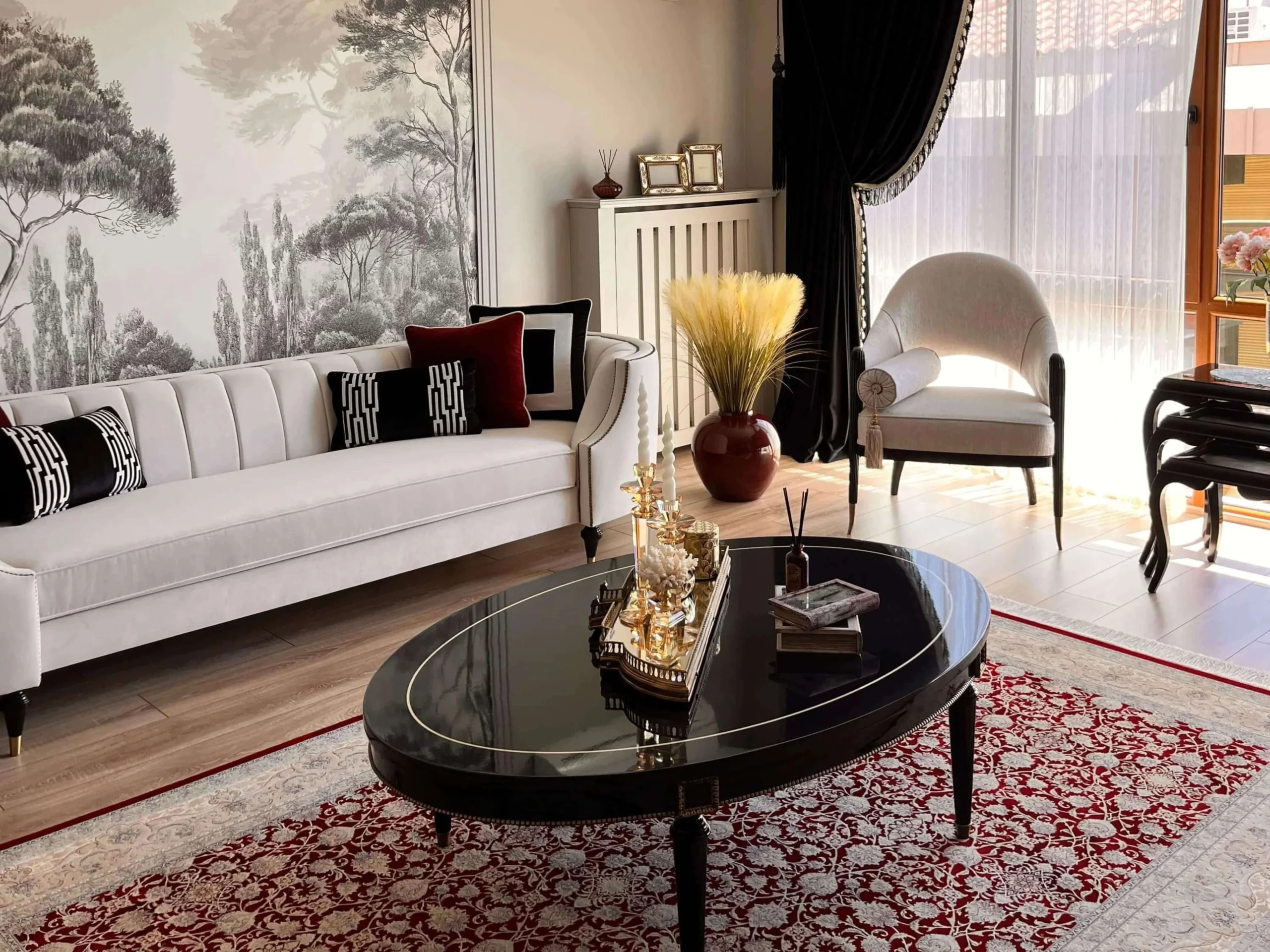 Elegant living room interior featuring an oval black marble coffee table.