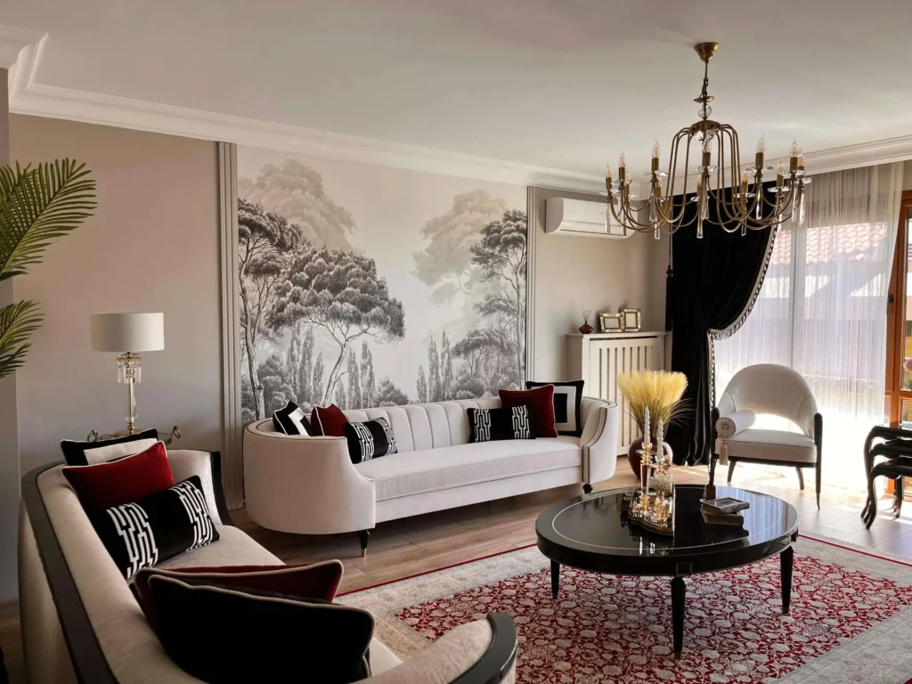 Classical living room featuring ornate wall paneling and a crystal chandelier.