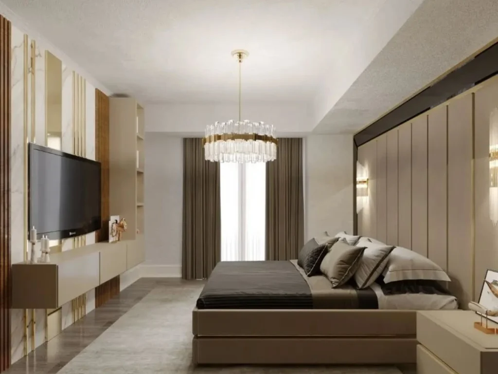 Master bedroom suite featuring a custom wooden headboard panel and modern pendant light.